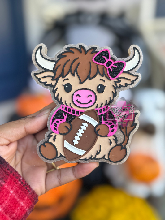 Cute Highland Cow With Football