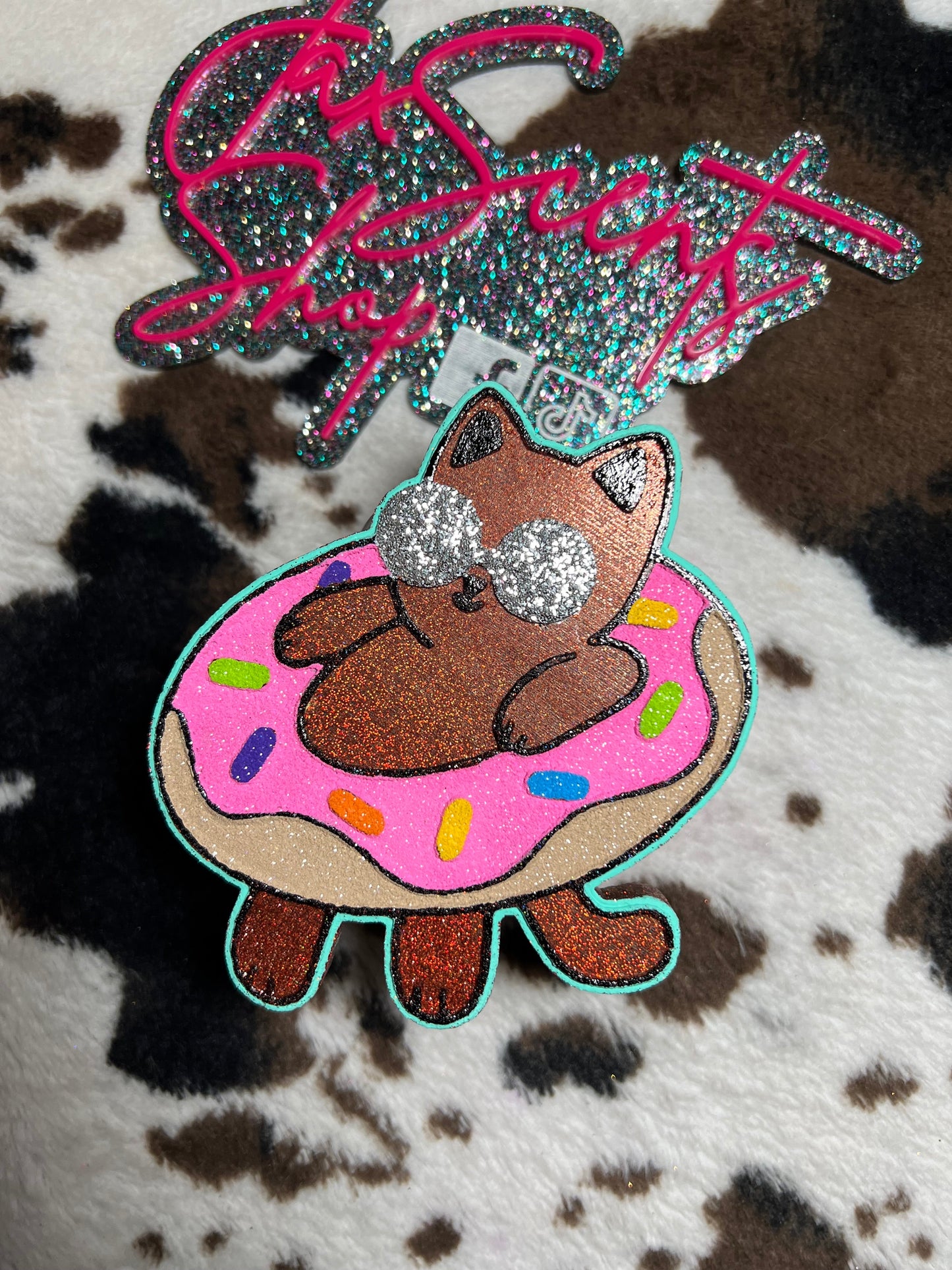 Cat in donut floatie