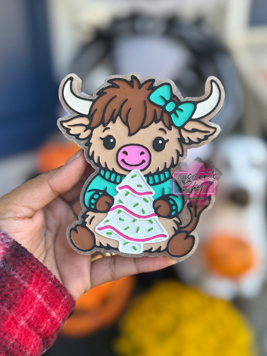 Cute Highland Cow With Snack Cake