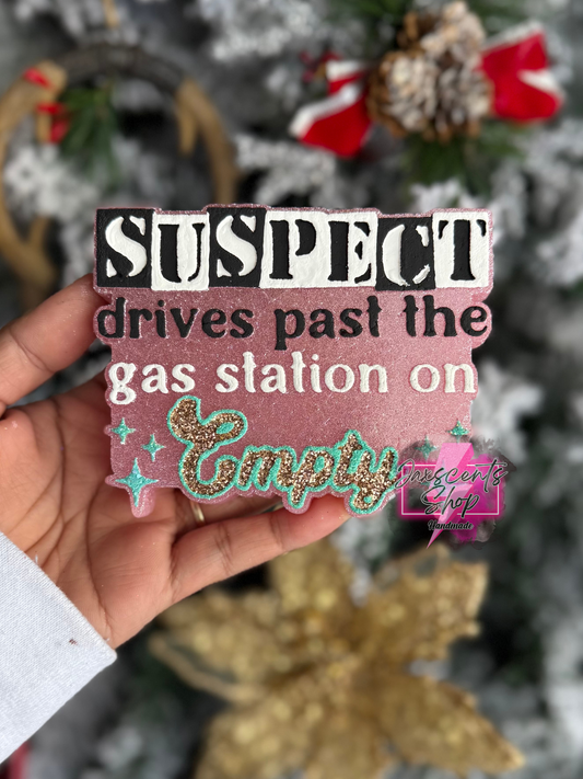 Suspect Drives Past the Gas Station on Empty