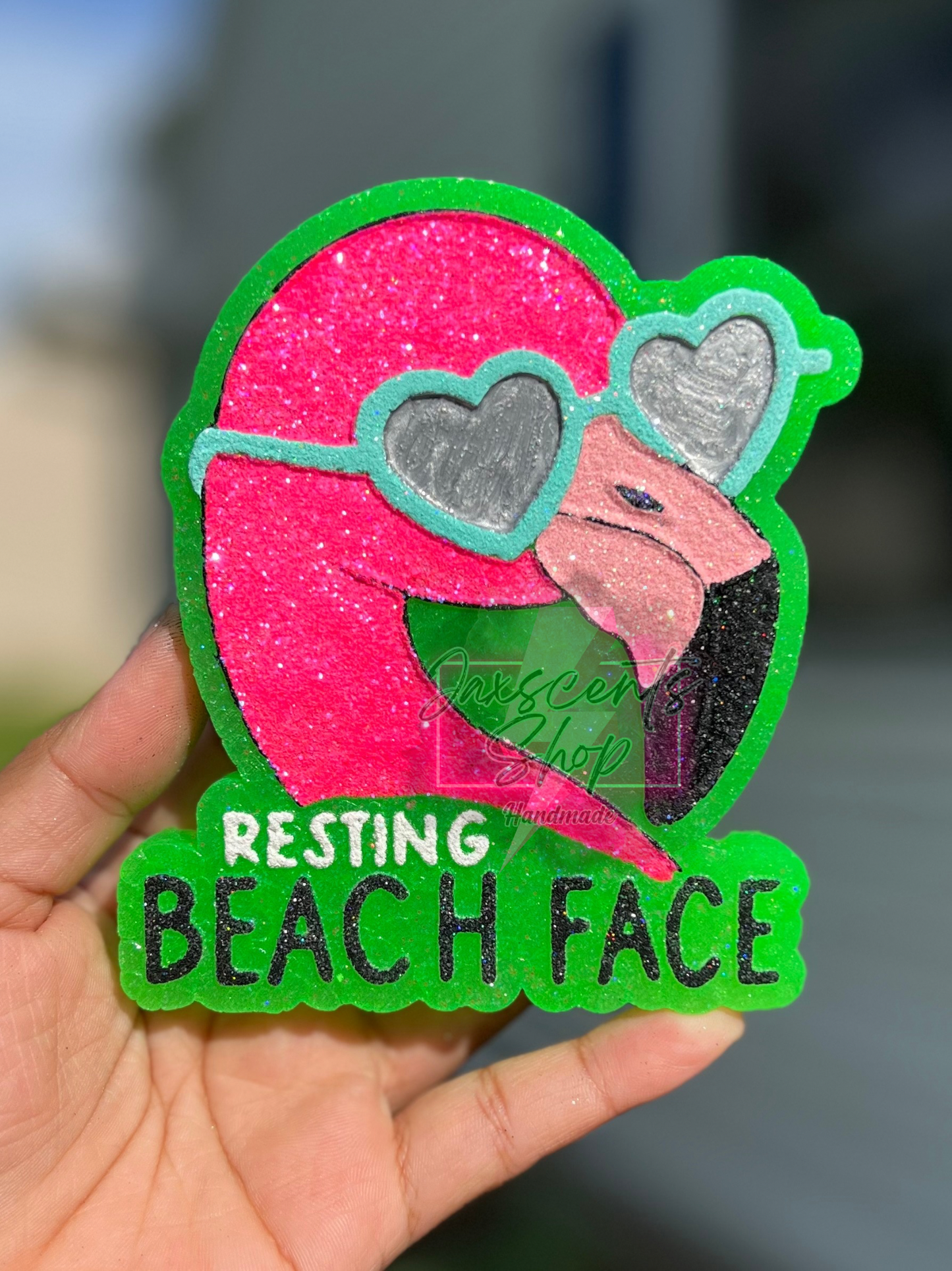 Resting beach face flamingo