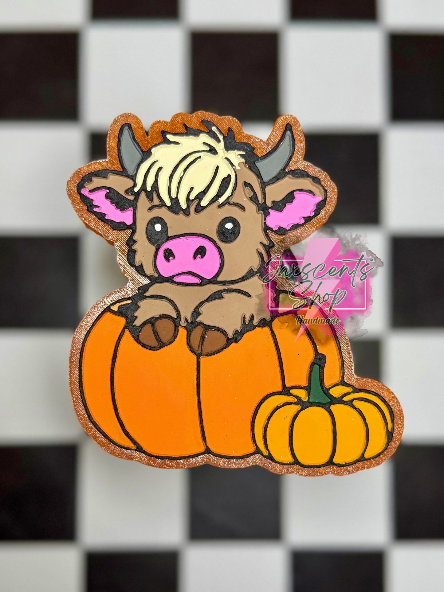 Highland Cow in a Pumpkin
